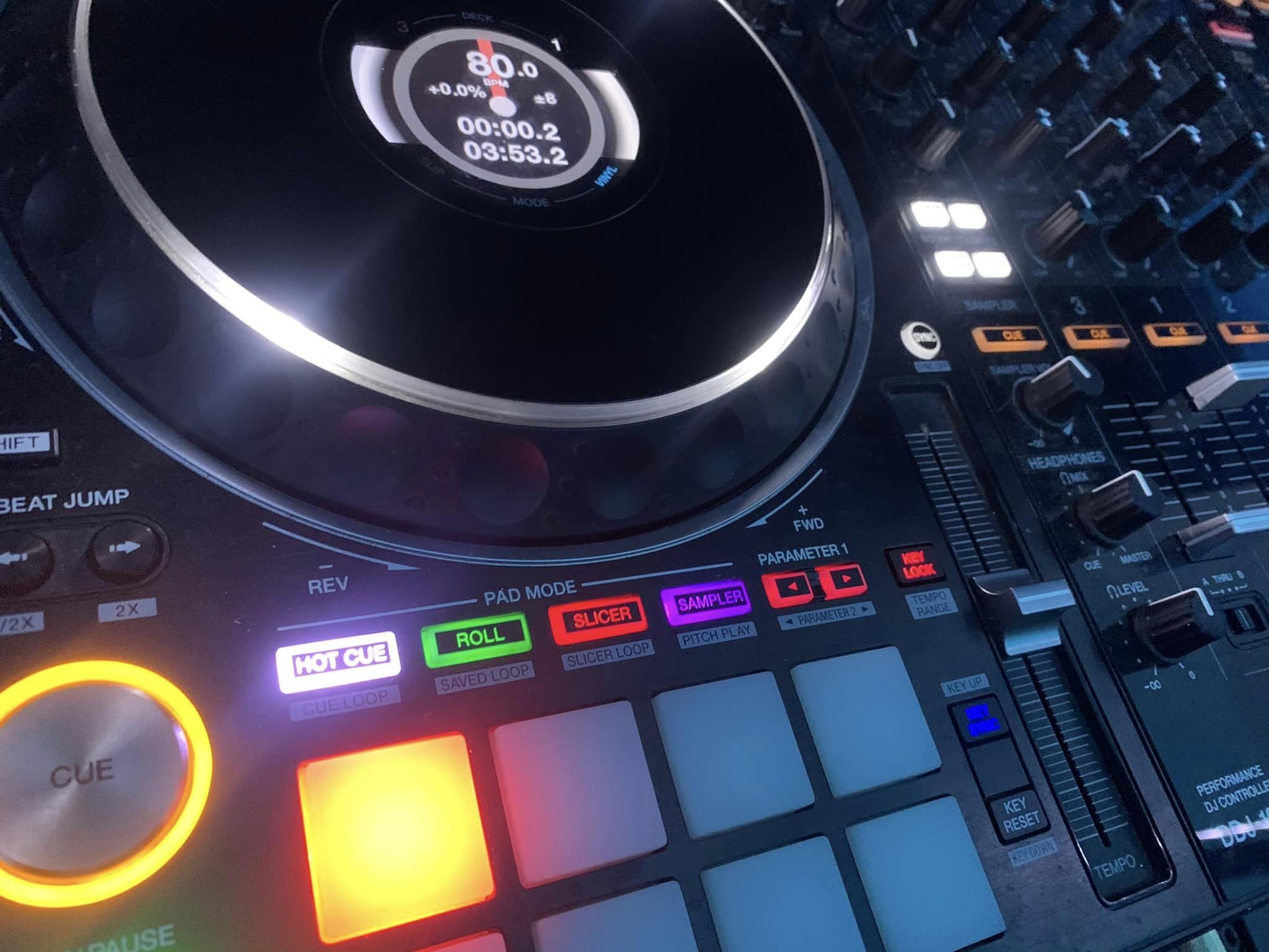 Close-up of a DJ controller lit in blue at a ProDJ Portsmouth event